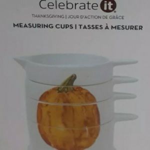 Never opened Pumpkin Measuring Cups (4 pc set) 1/4, 1/3, 1/2 & 1 cup